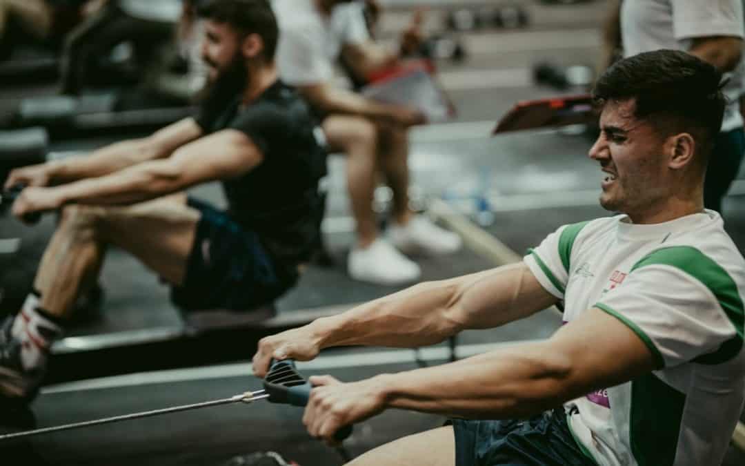 men rowing at gym