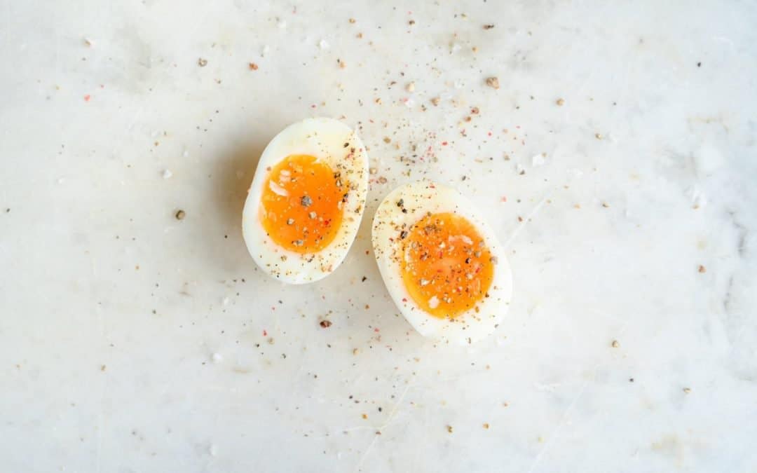 spiced soft boiled egg on marble tabletop